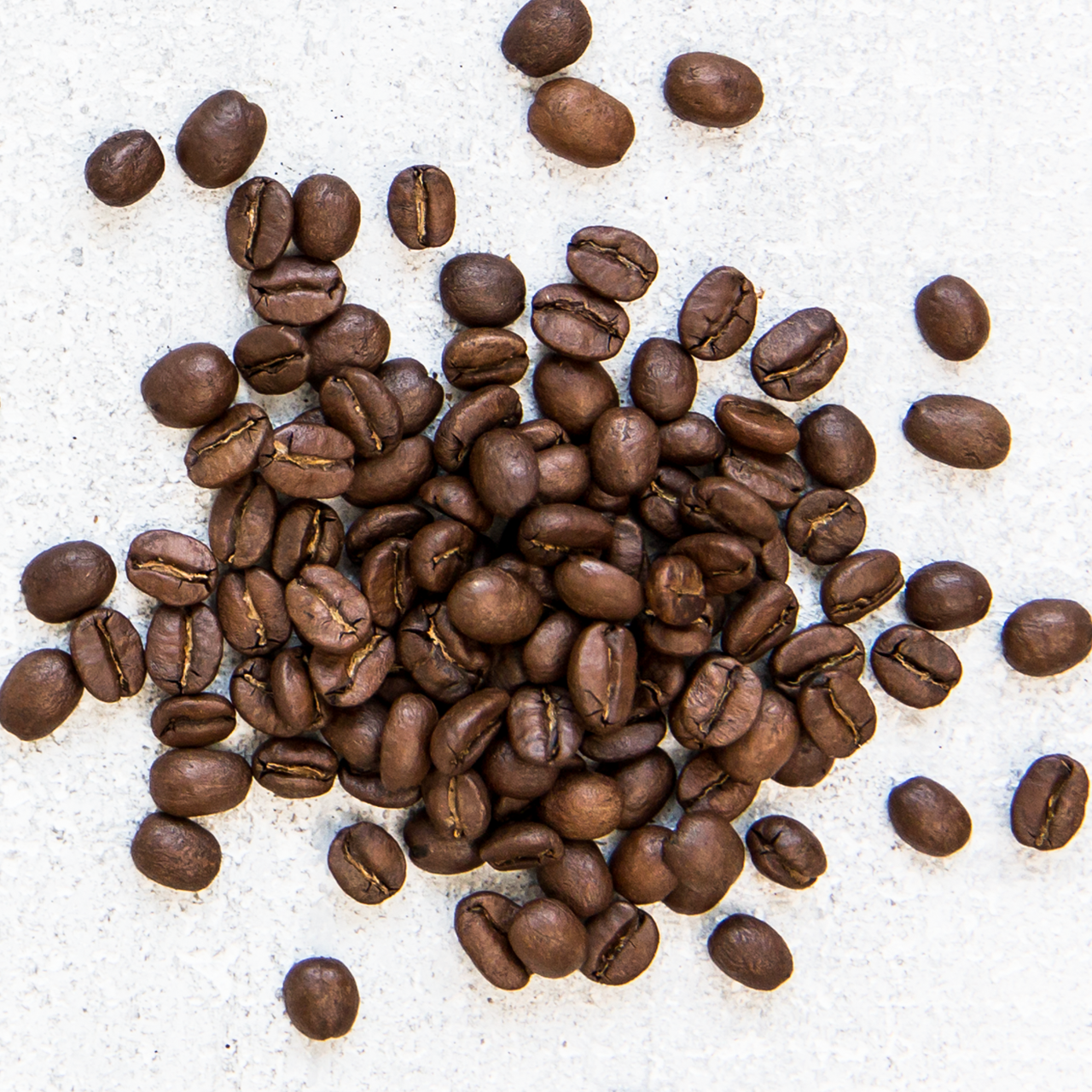 close up of whole bean Guatemalan coffee by Mt. Comfort