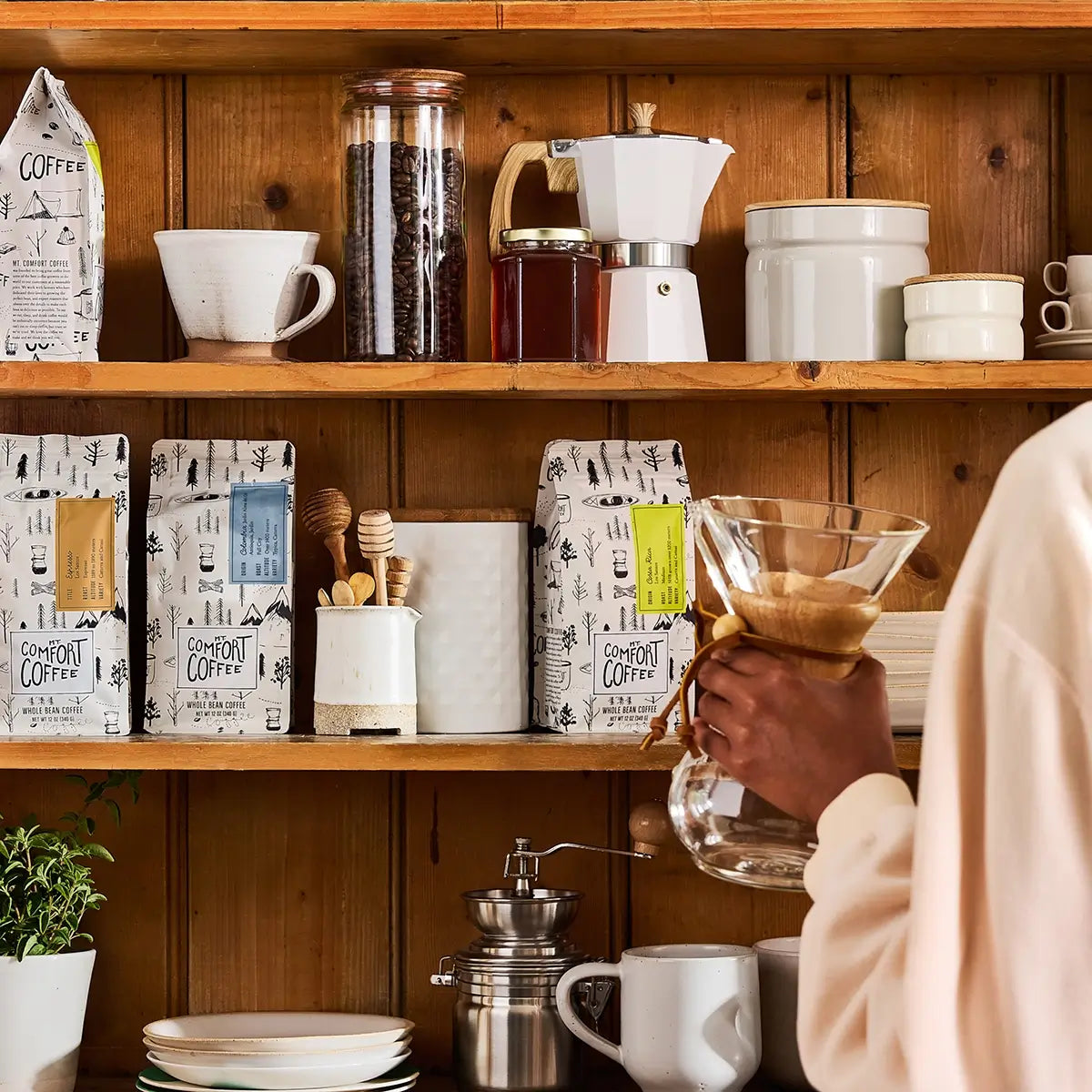 Shelf displaying Mt. Comfort Coffee Whole Bean Selections for Espresso