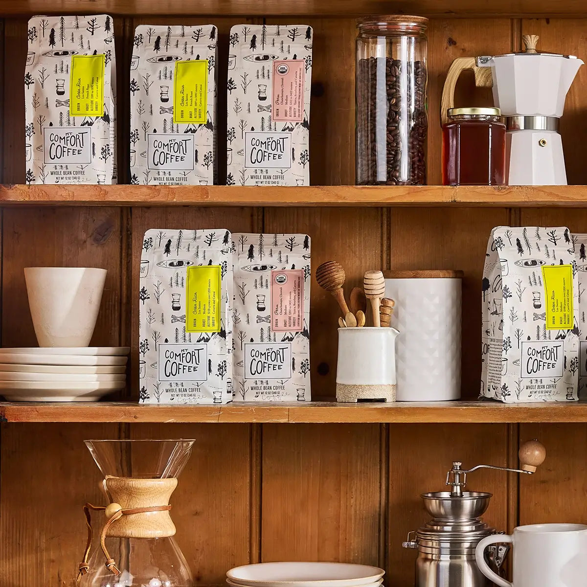 Shelf displaying Mt. Comfort Coffee medium roast whole bean bags
