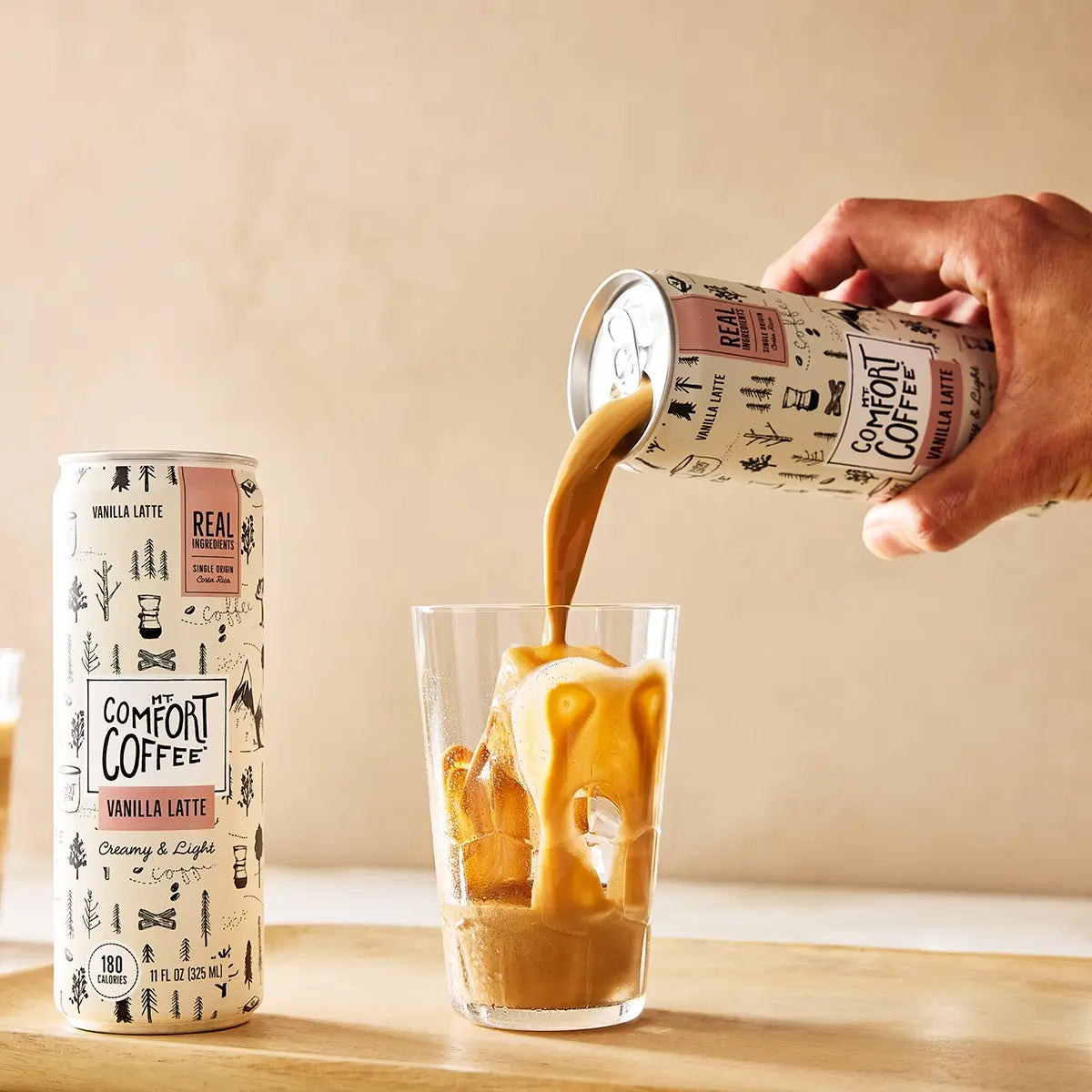 Mt. Comfort Coffee Canned Vanilla Latte being poured into glass