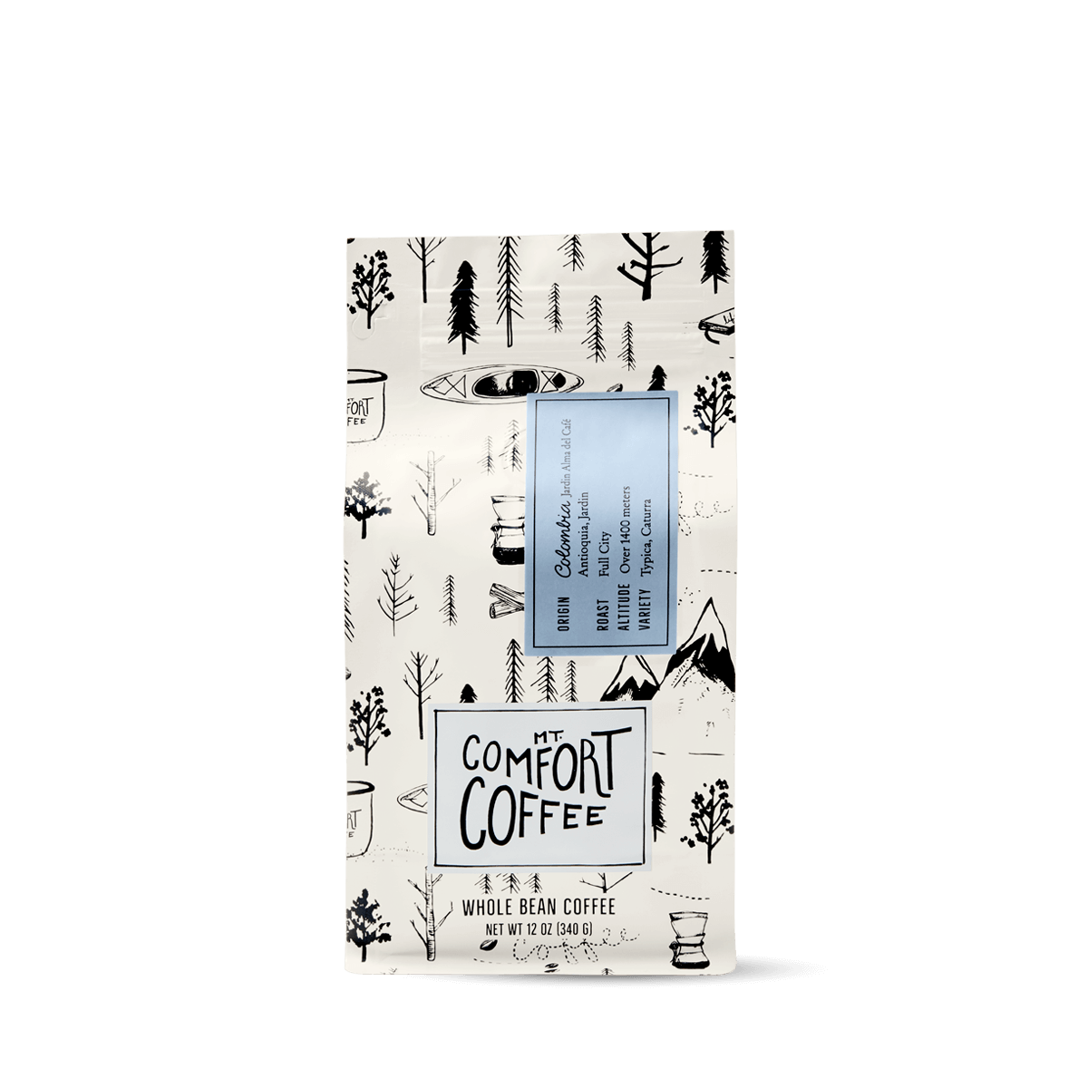 Packaging of Mt Comfort Colombian Coffee, Full City Roast, featuring a black and white design with coffee illustrations.