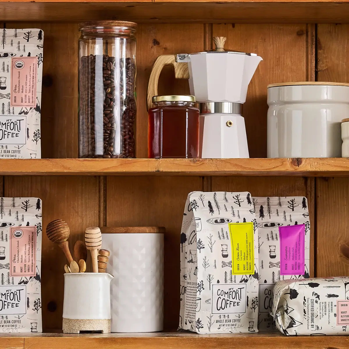 Shelf featuring Mt Comfort whole bean coffee bundles - shop gifts for coffee lovers