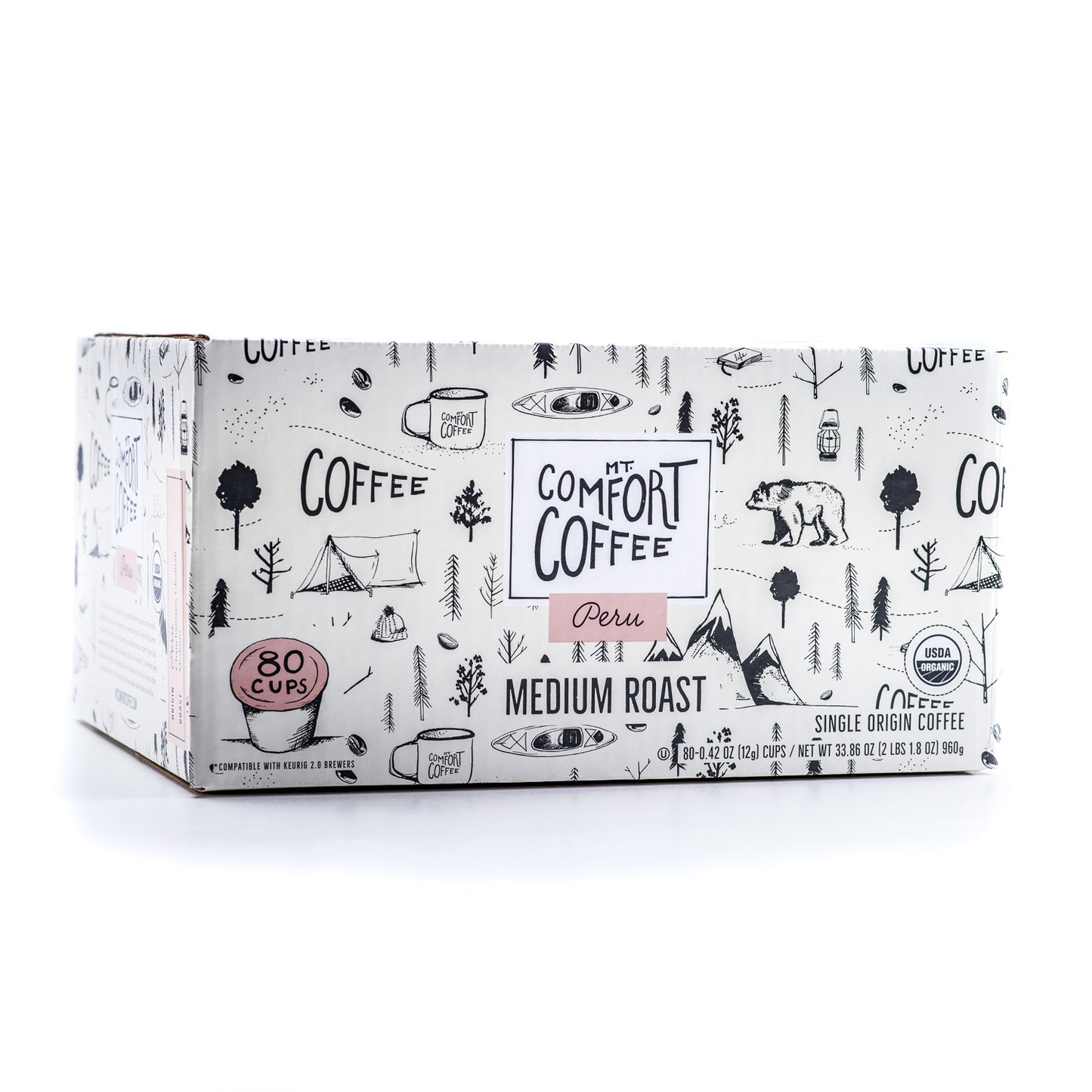 A box of Mt Comfort Organic Peru Medium Roast coffee pods with 80 single serve k- cups. The packaging has a black and white illustration theme with coffee plants, mountains, and the name of the coffee region.